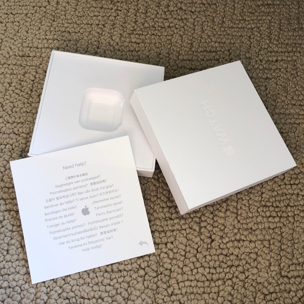 authentic Apple watch box and included insert and paper